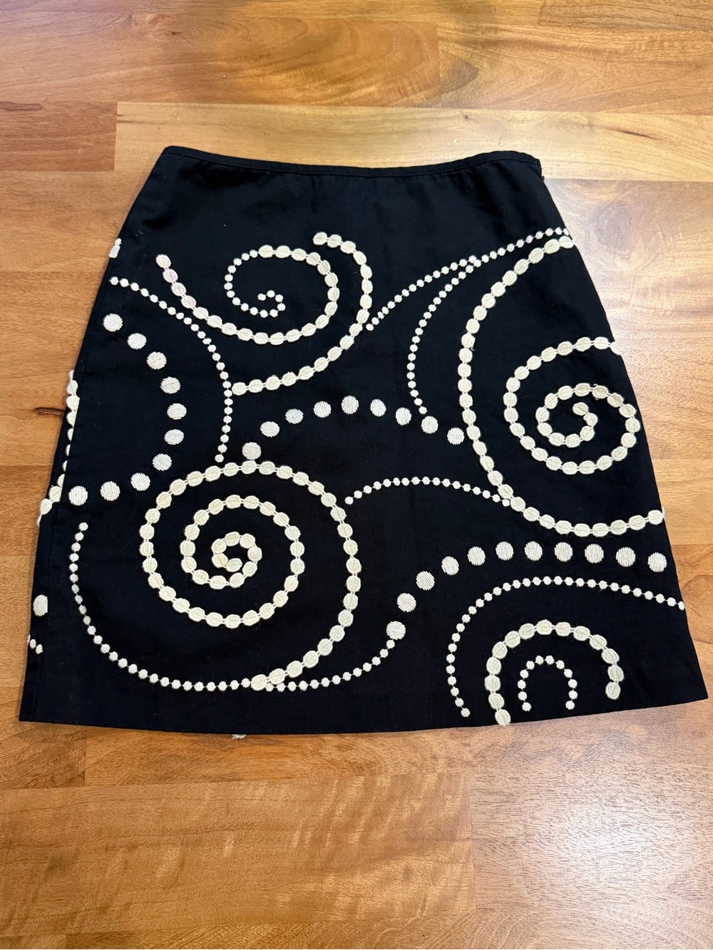 Black A-Line Skirt with Cream Spiral Dot Pattern